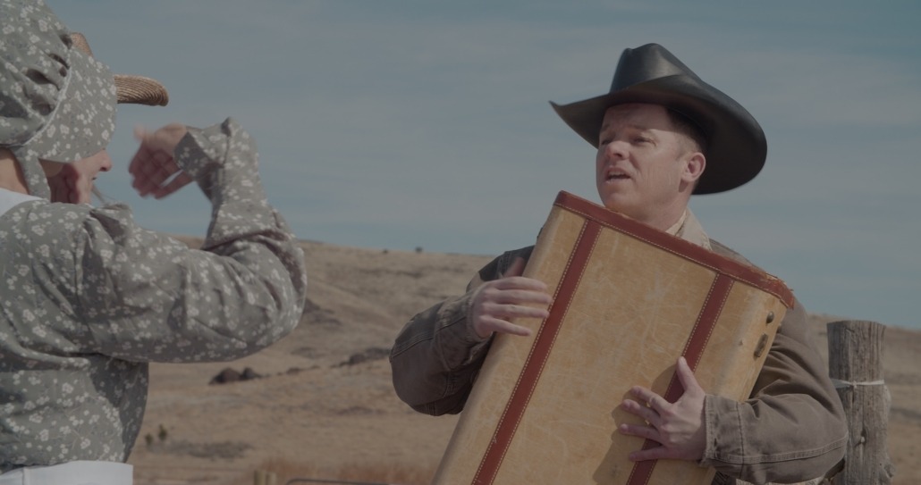 cletus pats a suitcase