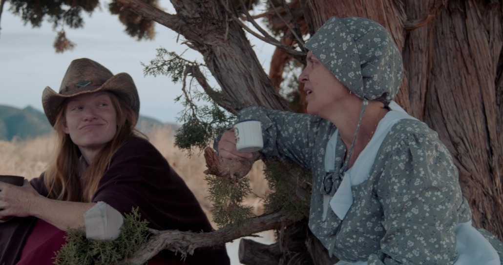 lily and emma talk and sip coffee together