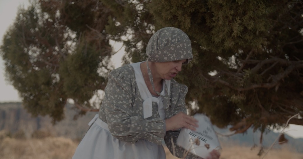 emma looks at a paper