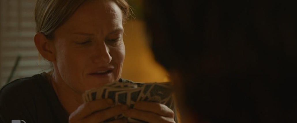 lily looks at her cards