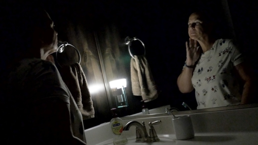 mother looks in a mirror