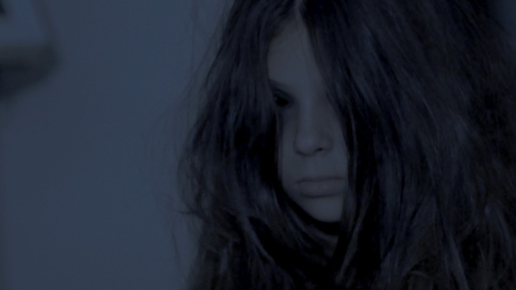 daughter with hair in face